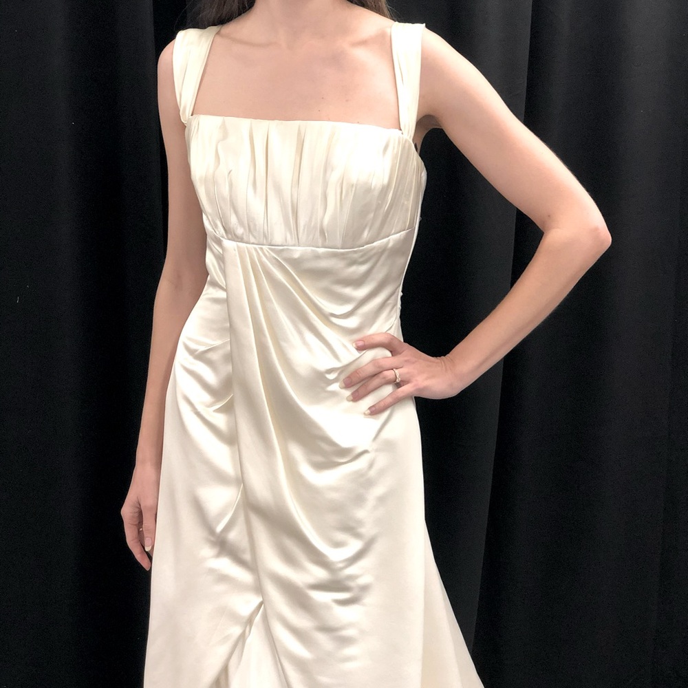 Ivory satin wedding gown